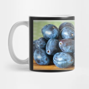 Fresh plums in the kitchen Mug